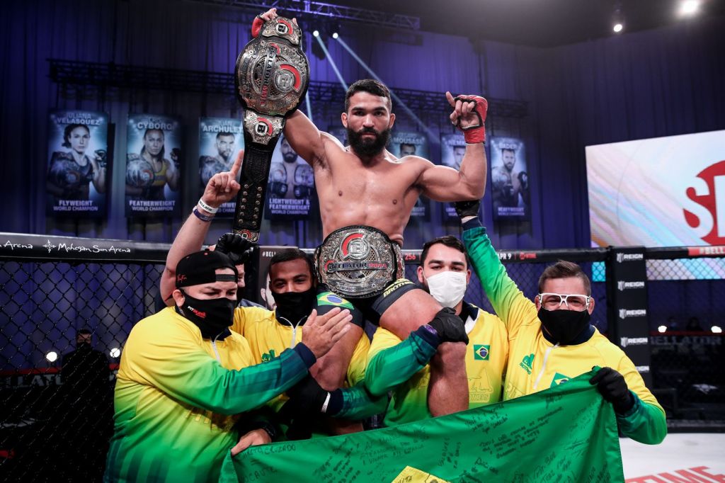 Patricio Pitbull gets hoisted on the shoulders of his team following his win.