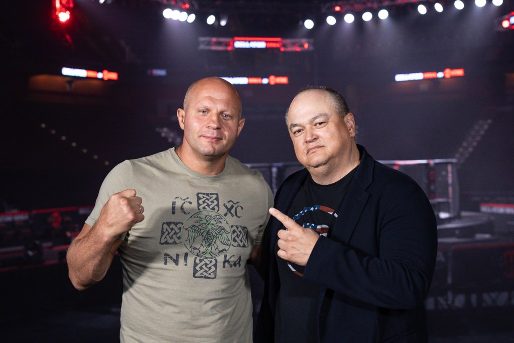 Fedor Emelianenko poses for a photo with Bellator President Scott Coker.