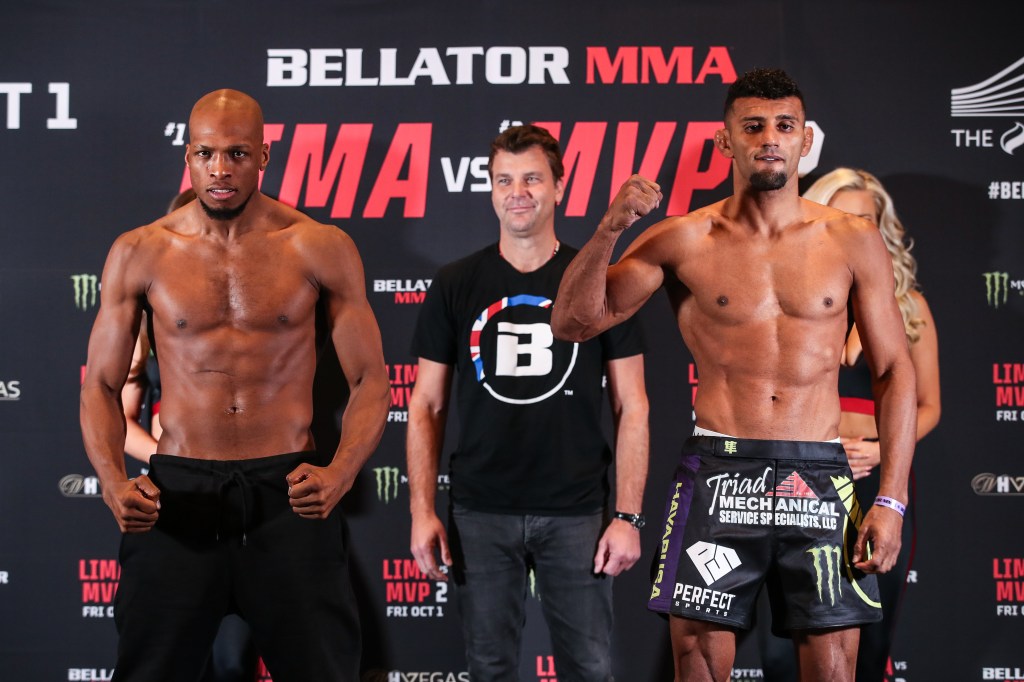 Michael Page and Douglas Lima pose at the Bellator 267 ceremonial weigh-ins.