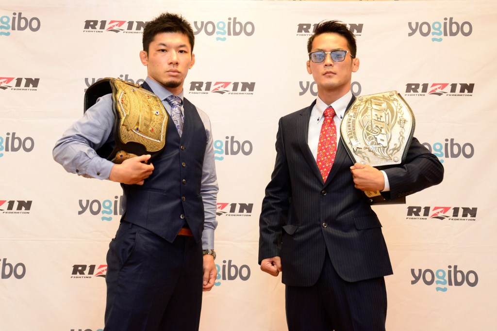 Yutaka Saito and Juntaro Ushiku pose at a RIZIN press conference.