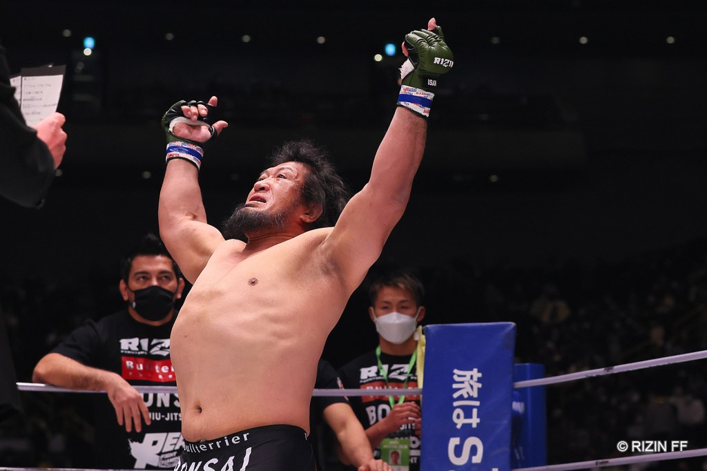 Hideki Sekine gets his arm raised in the RIZIN ring.