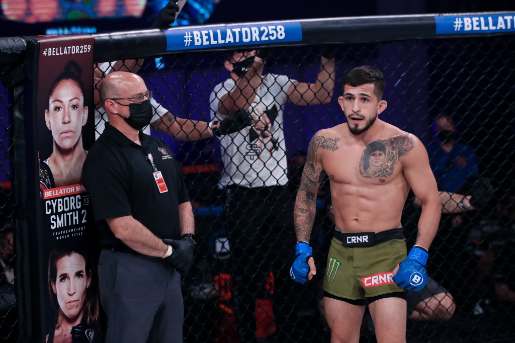 Sergio Pettis stands in the Bellator cage.