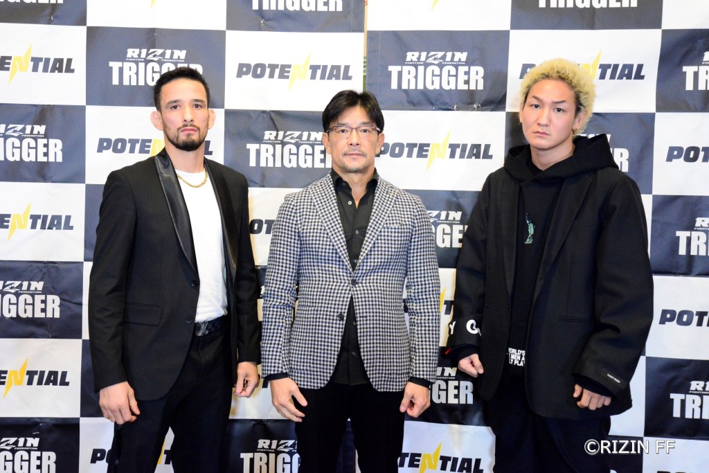 Kleber Koike, Nobuyuki Sakakibara and Ulka Sasaki pose at a press conference.