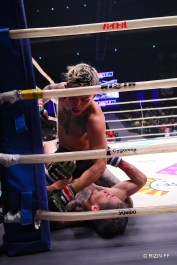 Kyohei Hagiwara lands ground and pound punches to Ren Hiramoto in the RIZIN ring.