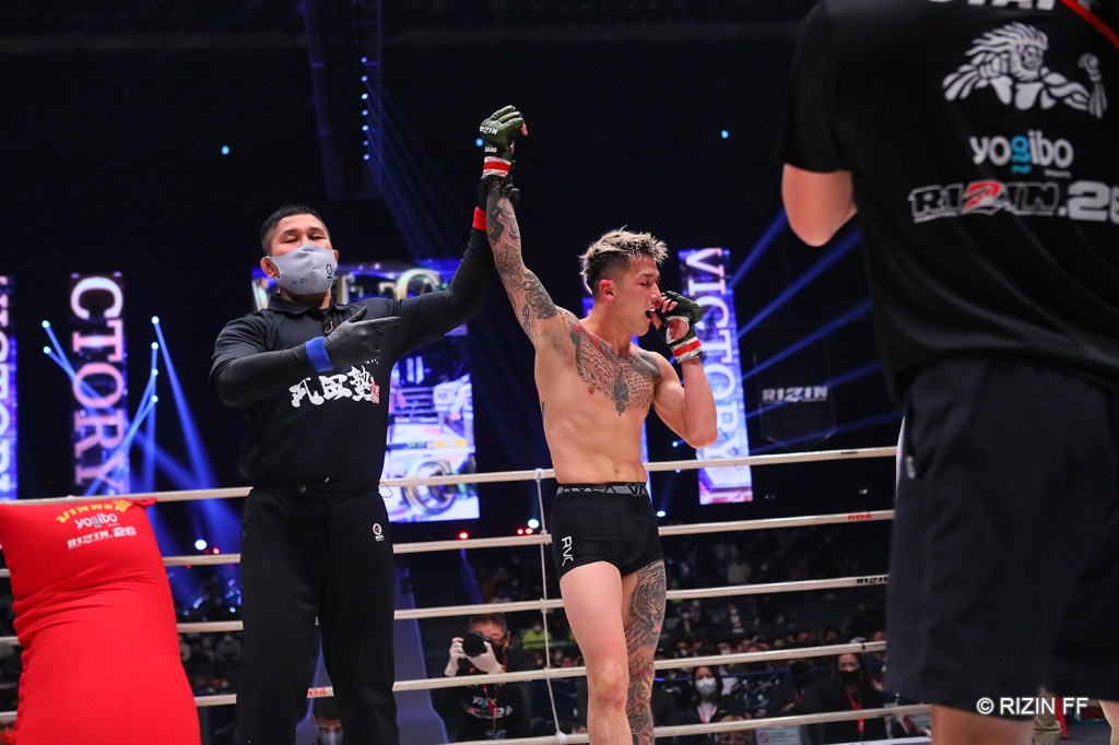 Kyohei Hagiwara getting his arm raised in the RIZIN ring.