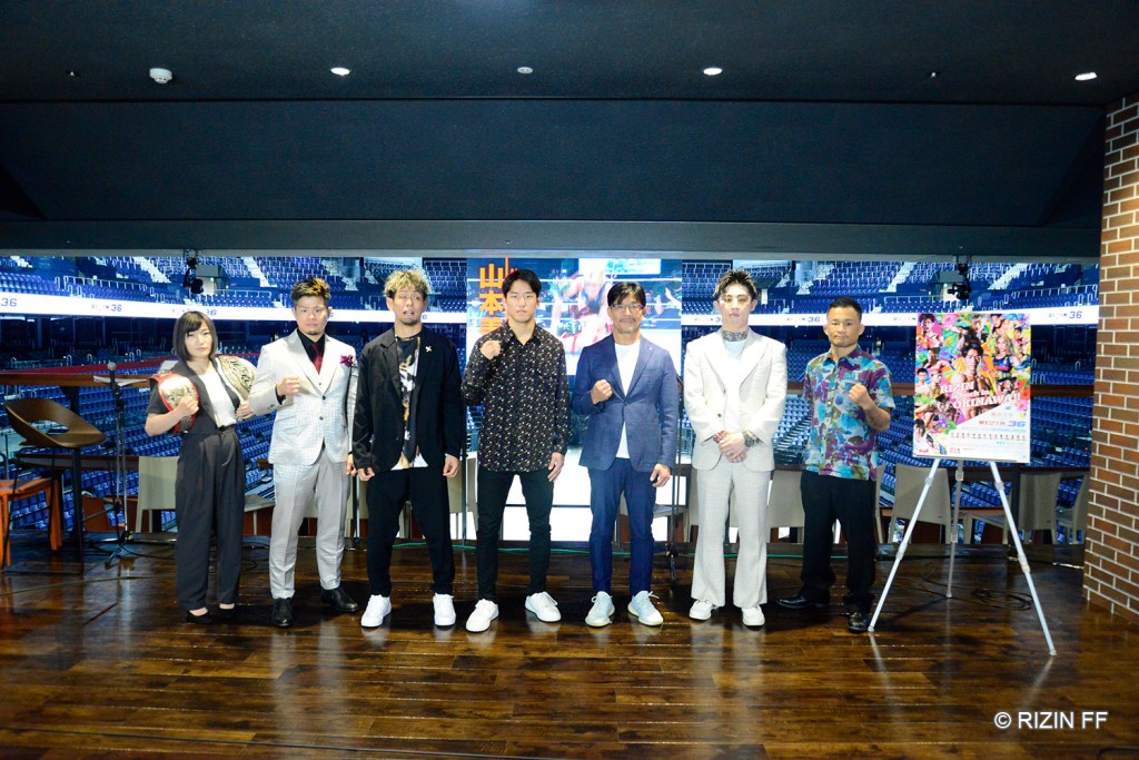 Fighters pose inside the Okinawa Arena.
