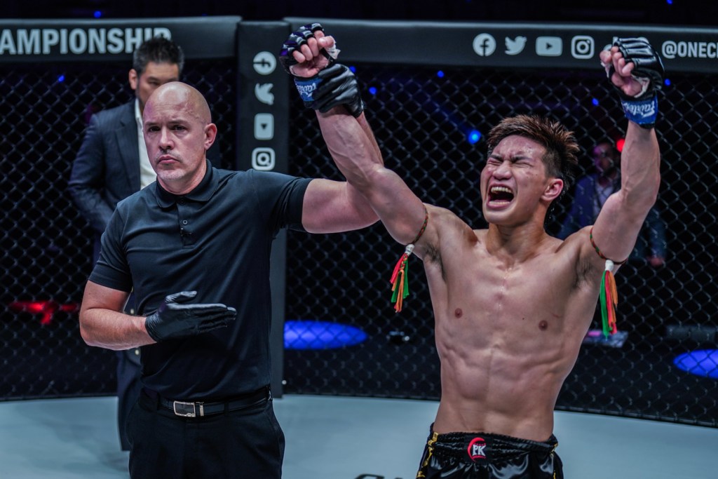 Tawanchai P.K.Saenchaimuaythaigym gets his arm raised inside the ONE cage.
