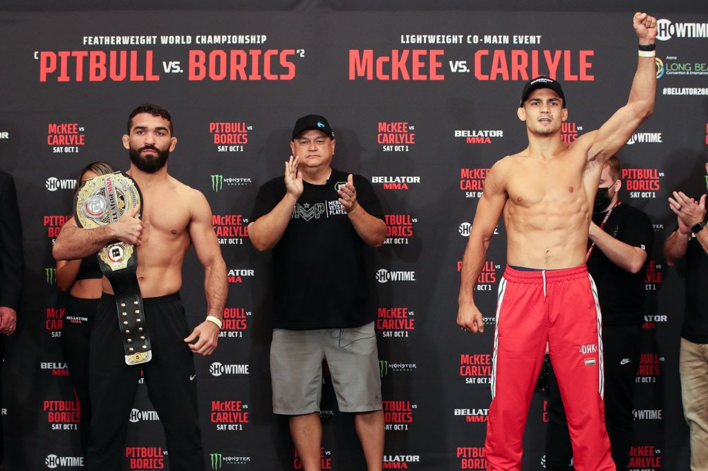 Patricio Pitbull and Adam Borics pose at the Bellator ceremonial weigh-ins.