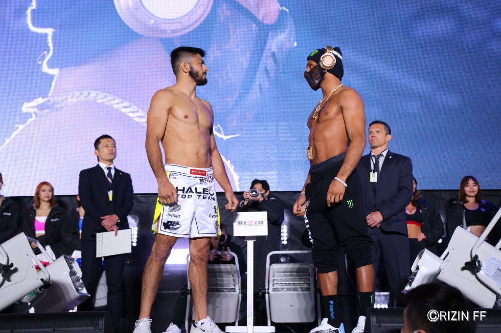 Roberto Satoshi Souza and A.J. McKee Jr. face off at a ceremonial weigh-ins.